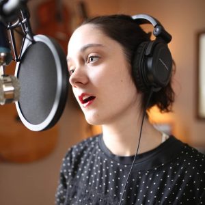 Sophia singing in the studio